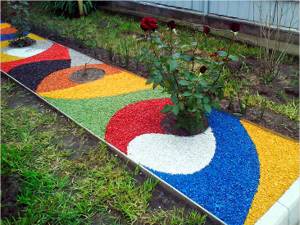 The path can be decorative from colored crushed stone