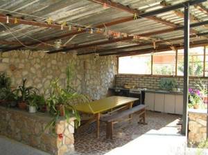 Summer kitchen under a canopy