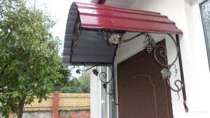DIY canopy over the porch of a private house