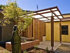 Sheds attached to the house, made of polycarbonate (52 photos): functions, types, pros and cons