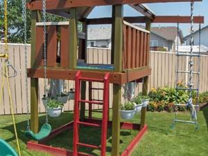 a small playground for children made from scrap materials