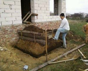Preparing a pit for a porch