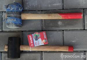 Rubber hammer for laying paving stones